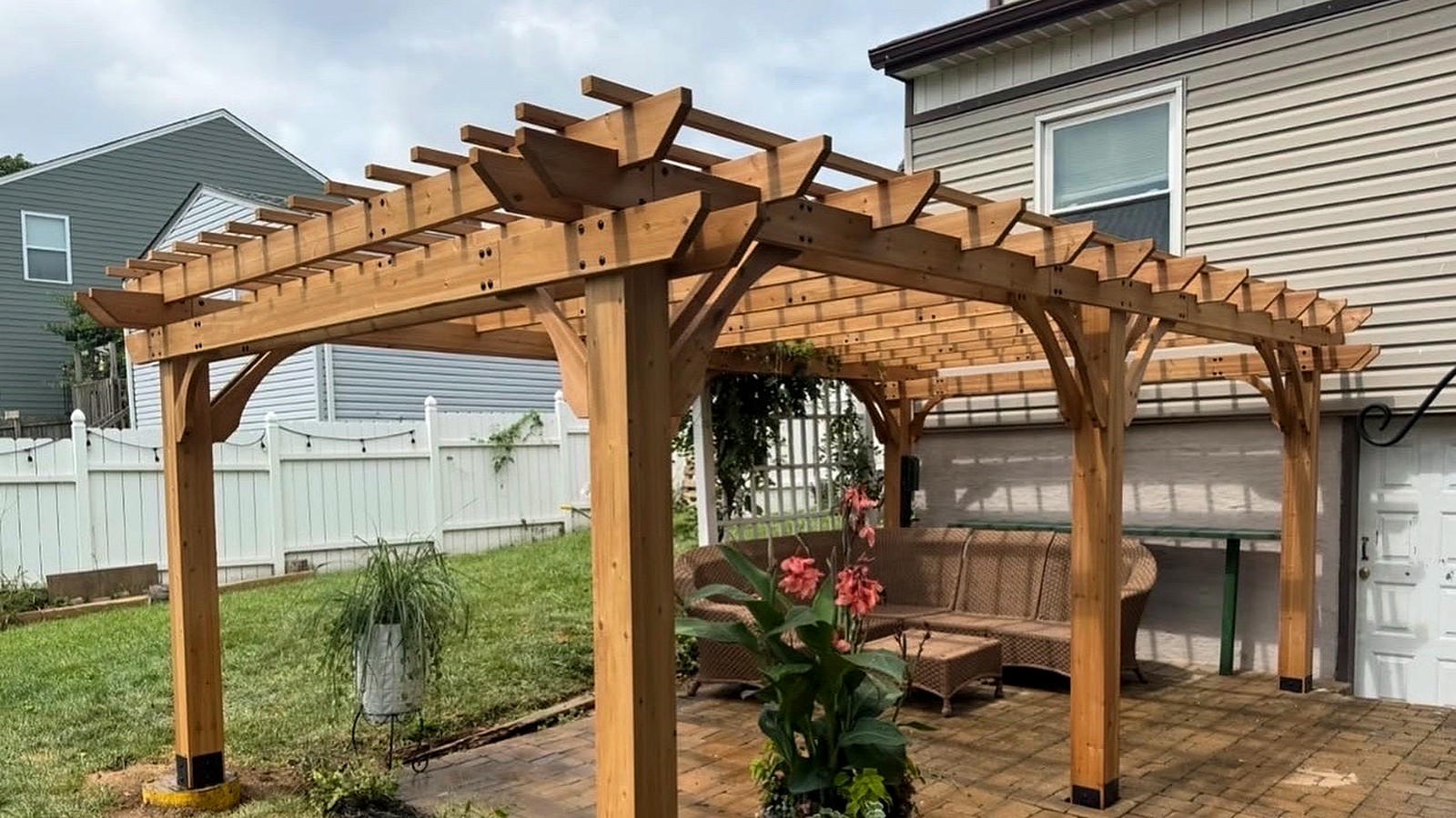 Cedar pergola and paver patio for residential outdoor living